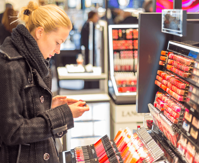 Profit Isle for Retail: Woman shopping at a beauty counter